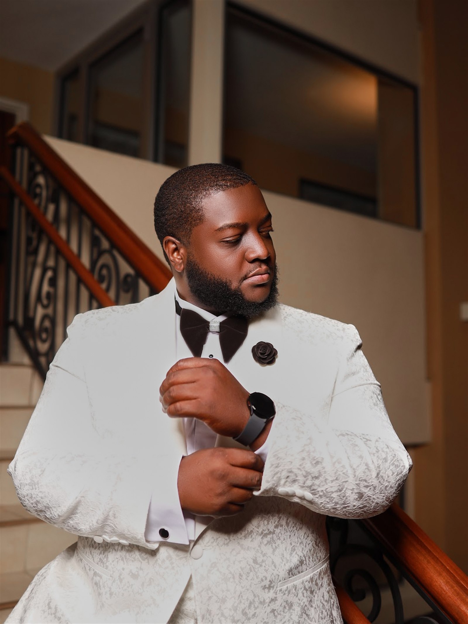 Mkhuzo Mwanza in a white formal jacket